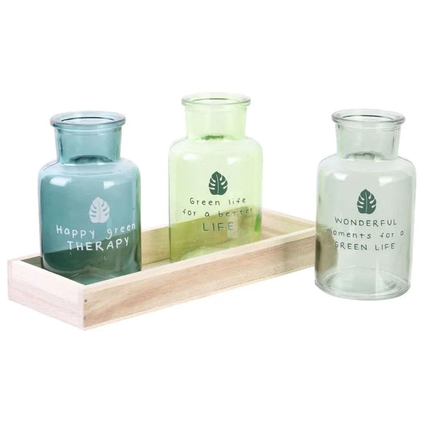 Set aus drei Glasvasen mit Holzständer