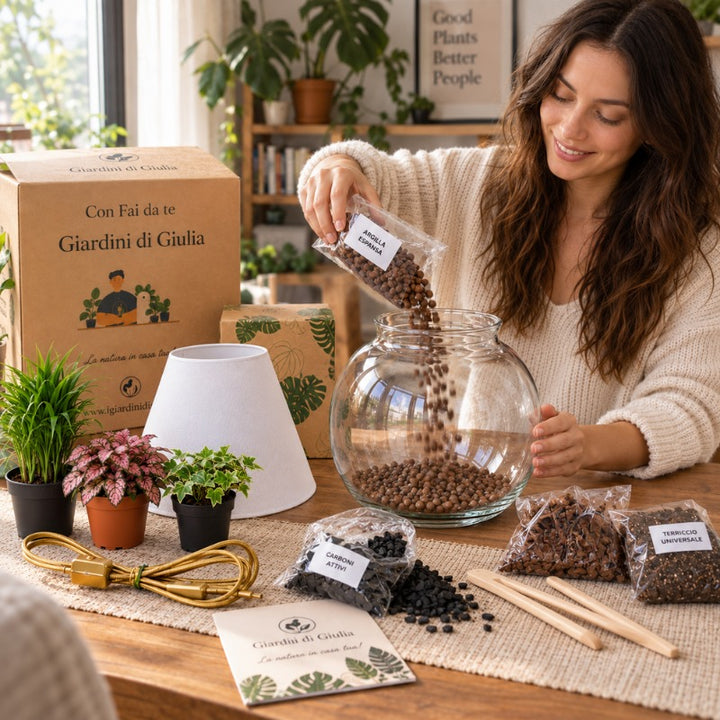 Donna che realizza il kit Lamparium grande con vaso in vetro, argilla espansa, substrato e accessori